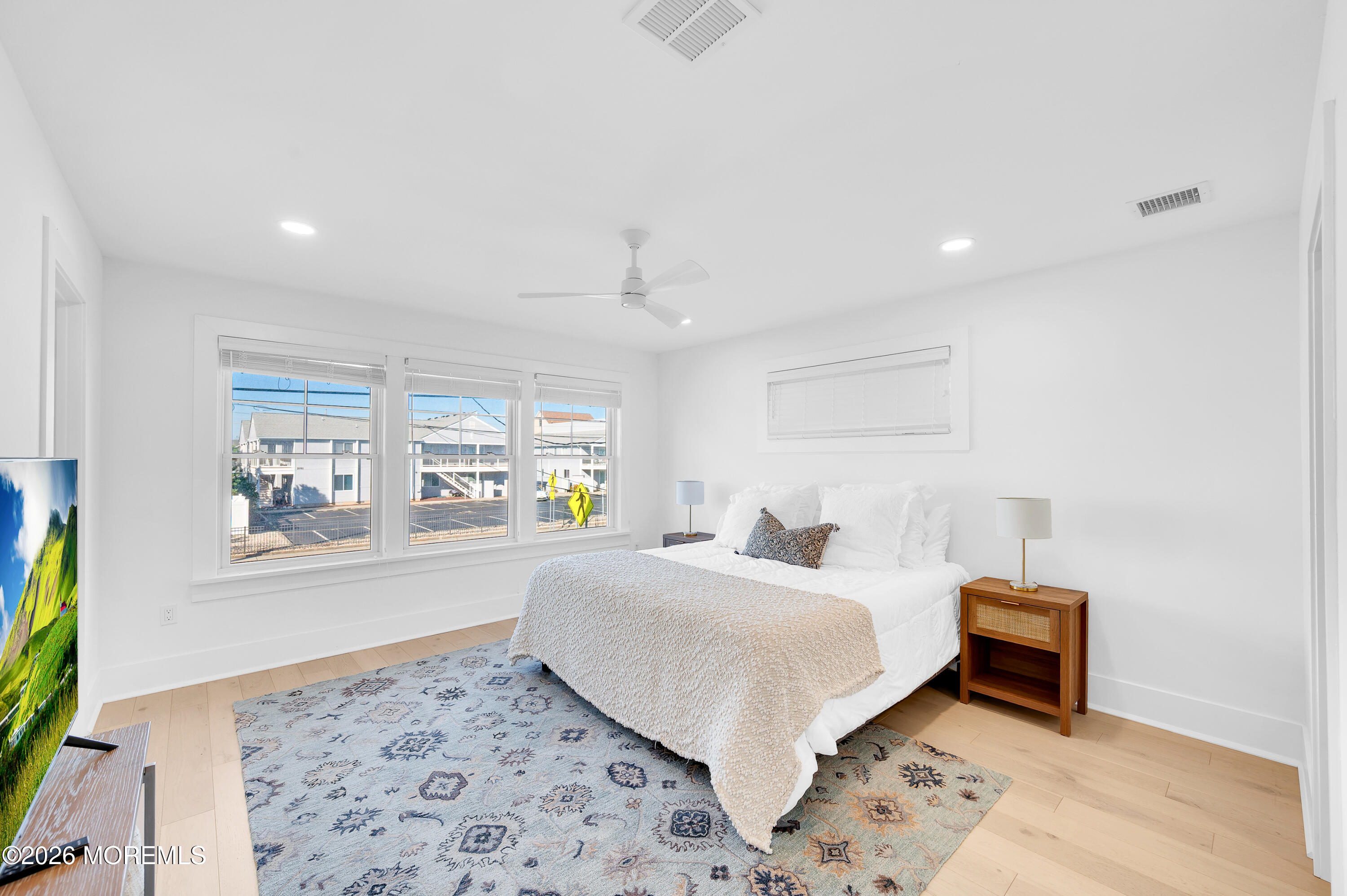 2000 Highway 35 Seaside Heights, NJ 08751 - Photo 27 of 55 a bedroom with a large bed and a couch