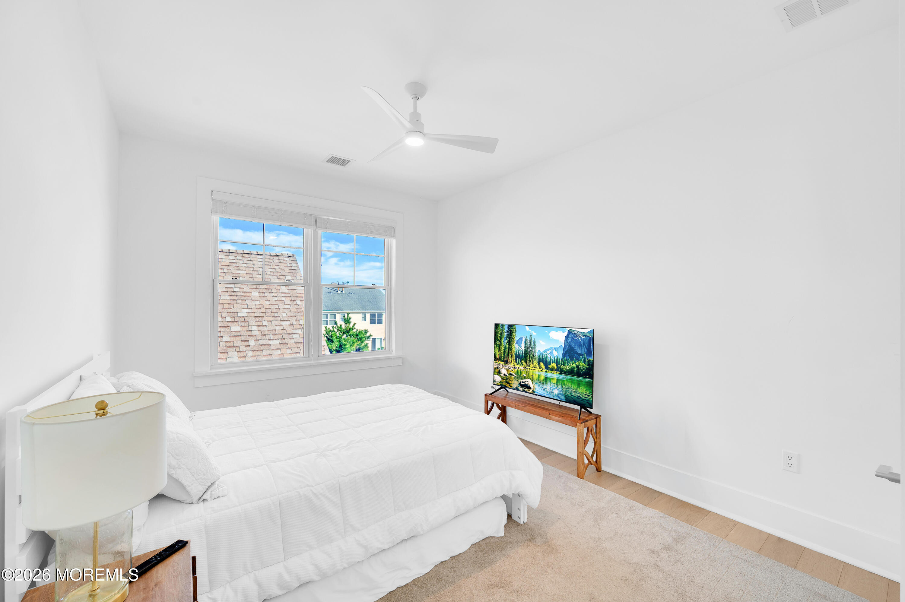 2000 Highway 35 Seaside Heights, NJ 08751 - Photo 32 of 55 a bedroom with a bed and a window