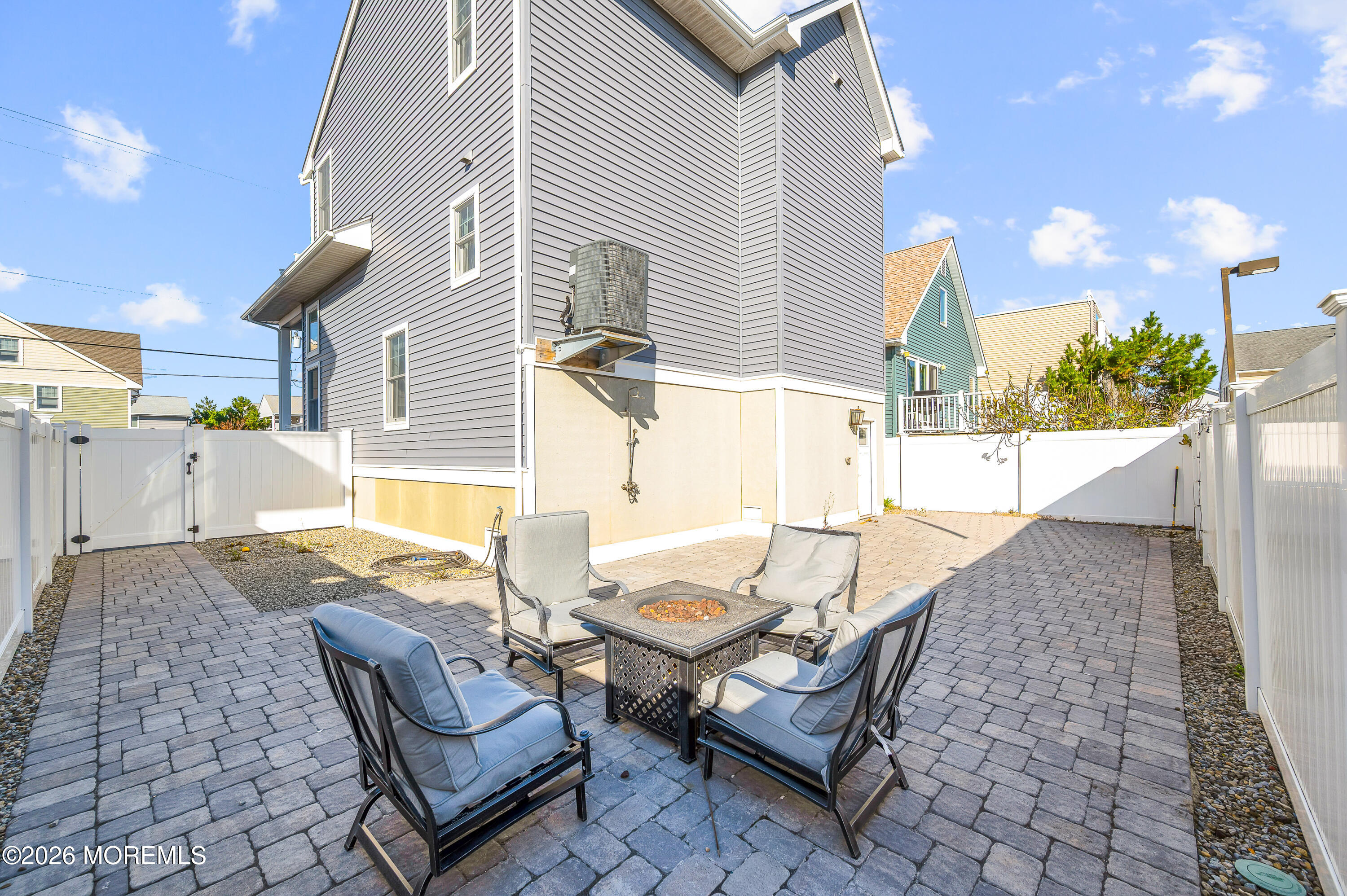 2000 Highway 35 Seaside Heights, NJ 08751 - Photo 37 of 55 a view of a patio with a dining table and chairs with wooden floor