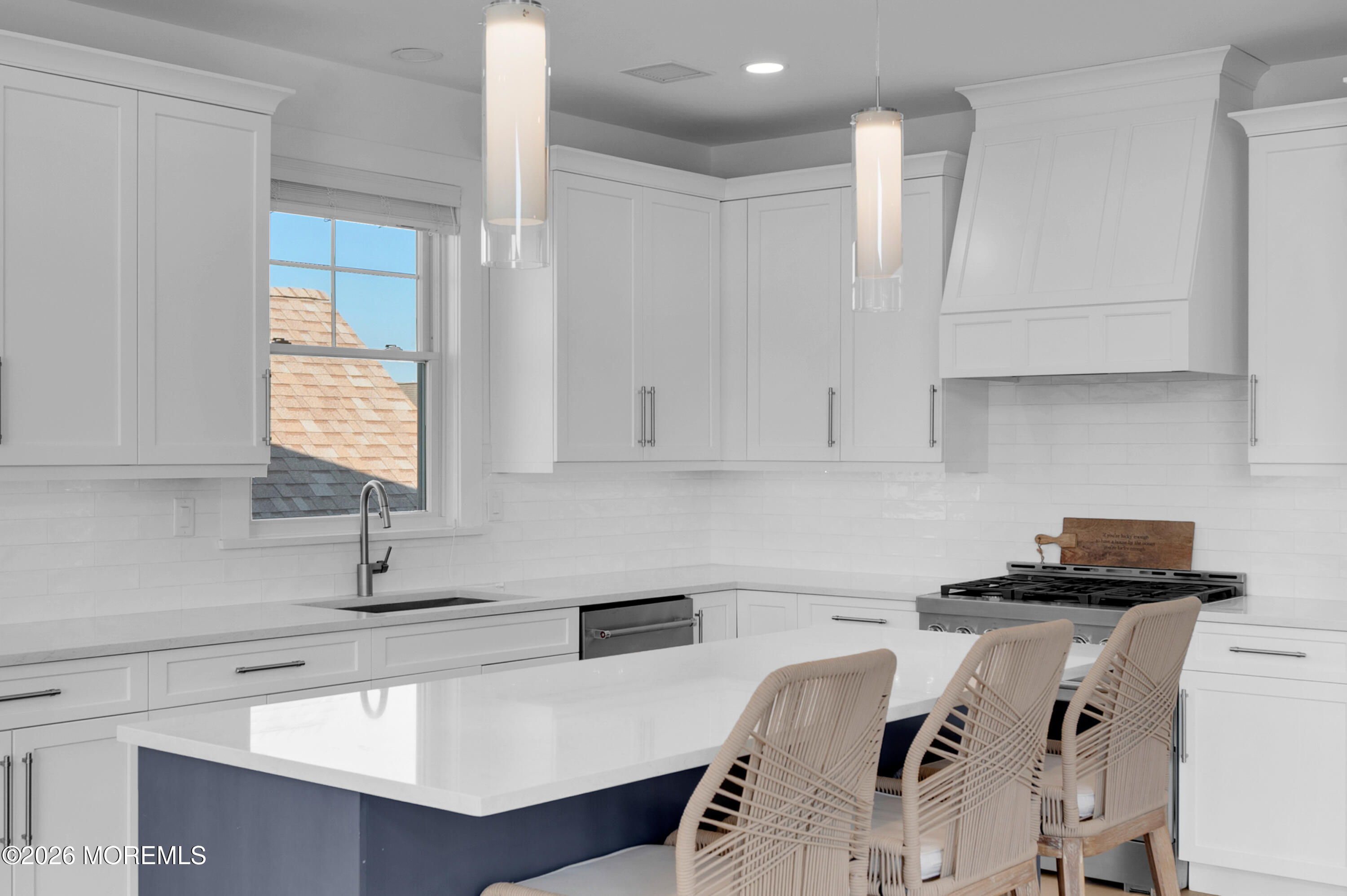 2000 Highway 35 Seaside Heights, NJ 08751 - Photo 6 of 55 a kitchen with a sink a window and cabinets