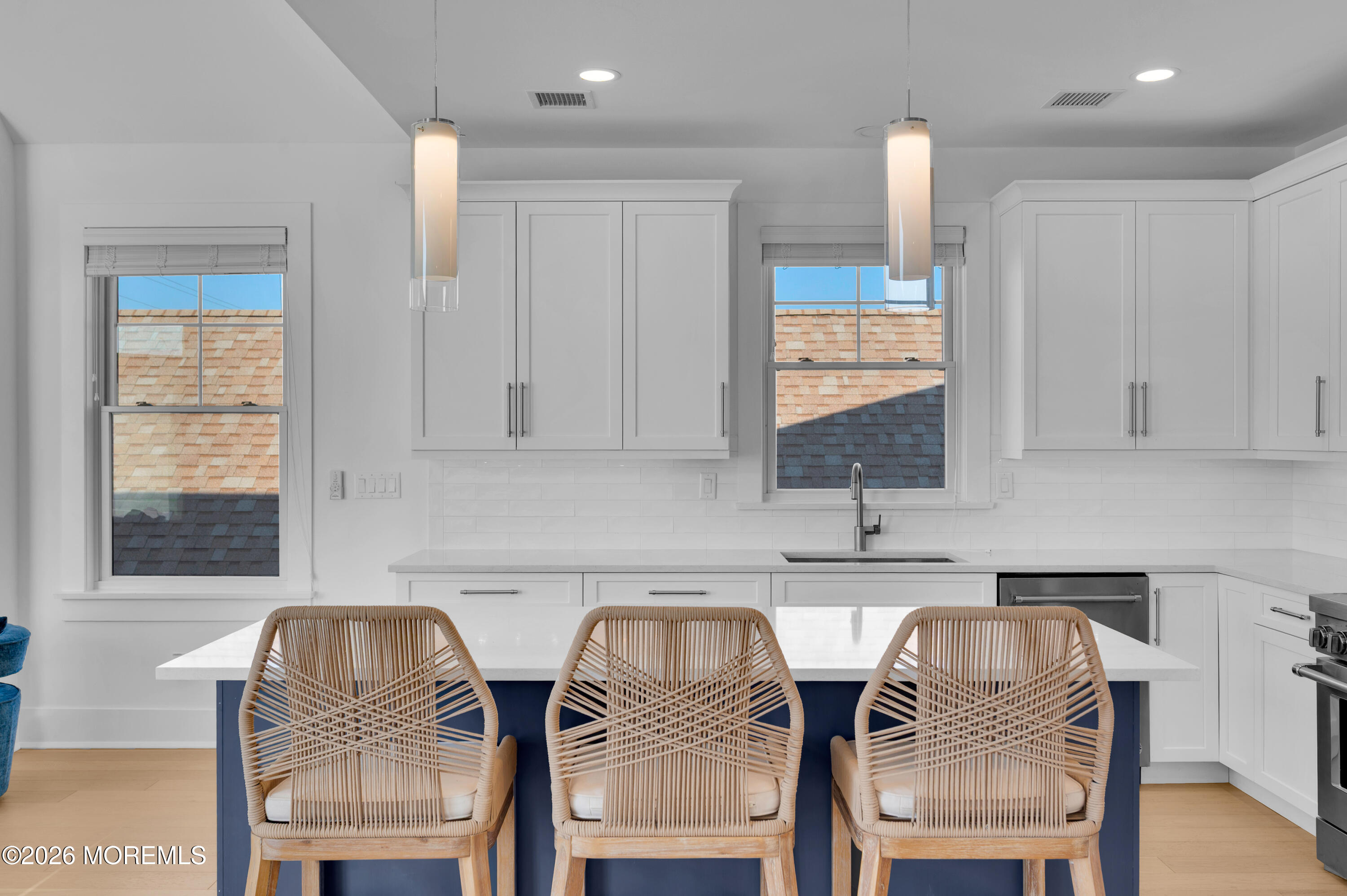 2000 Highway 35 Seaside Heights, NJ 08751 - Photo 8 of 55 a kitchen with a table chairs sink and window