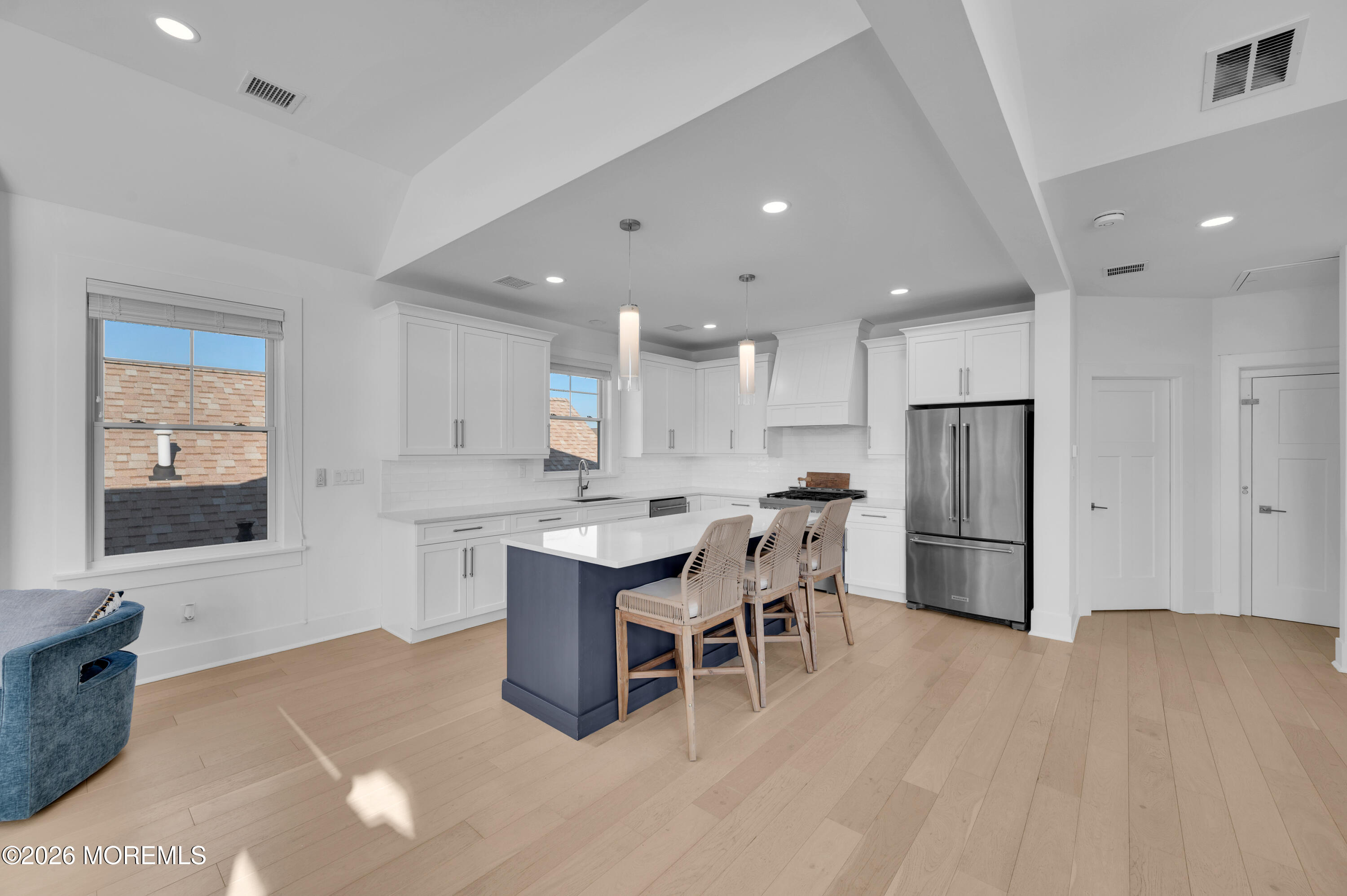 2000 Highway 35 Seaside Heights, NJ 08751 - Photo 9 of 55 a large kitchen with a table and chairs in it