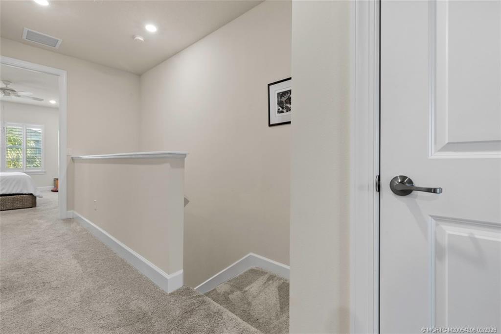 1810 Southeast Ocean Cove Way Stuart, FL 34996 - Photo 15 of 28 a view of hallway with a room
