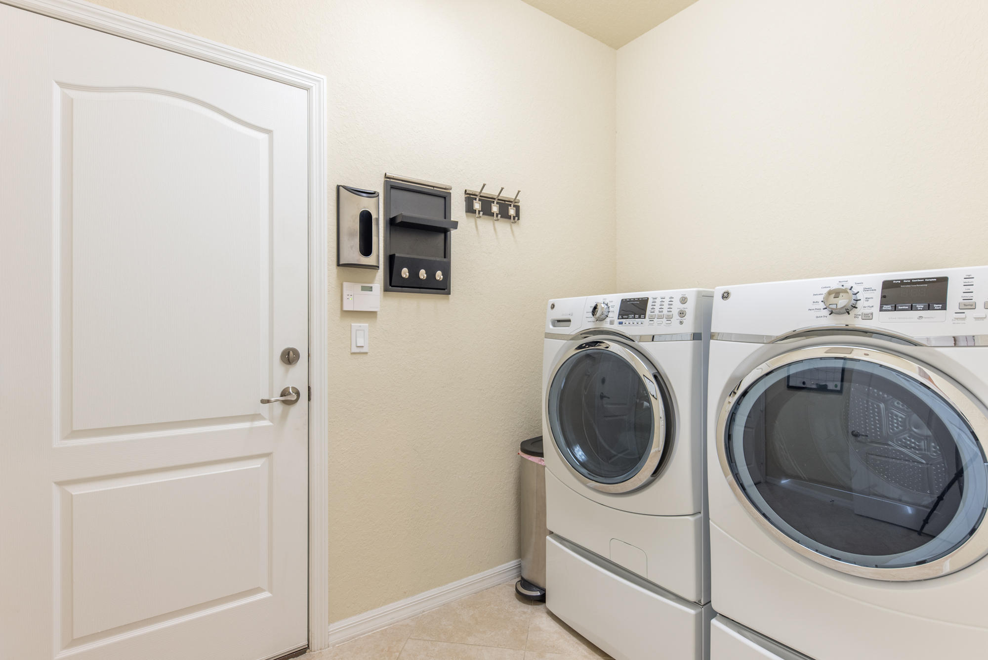 151 Rudder Cay Way Jupiter, FL 33458 - Photo 20 of 32 a utility room with dryer and washer