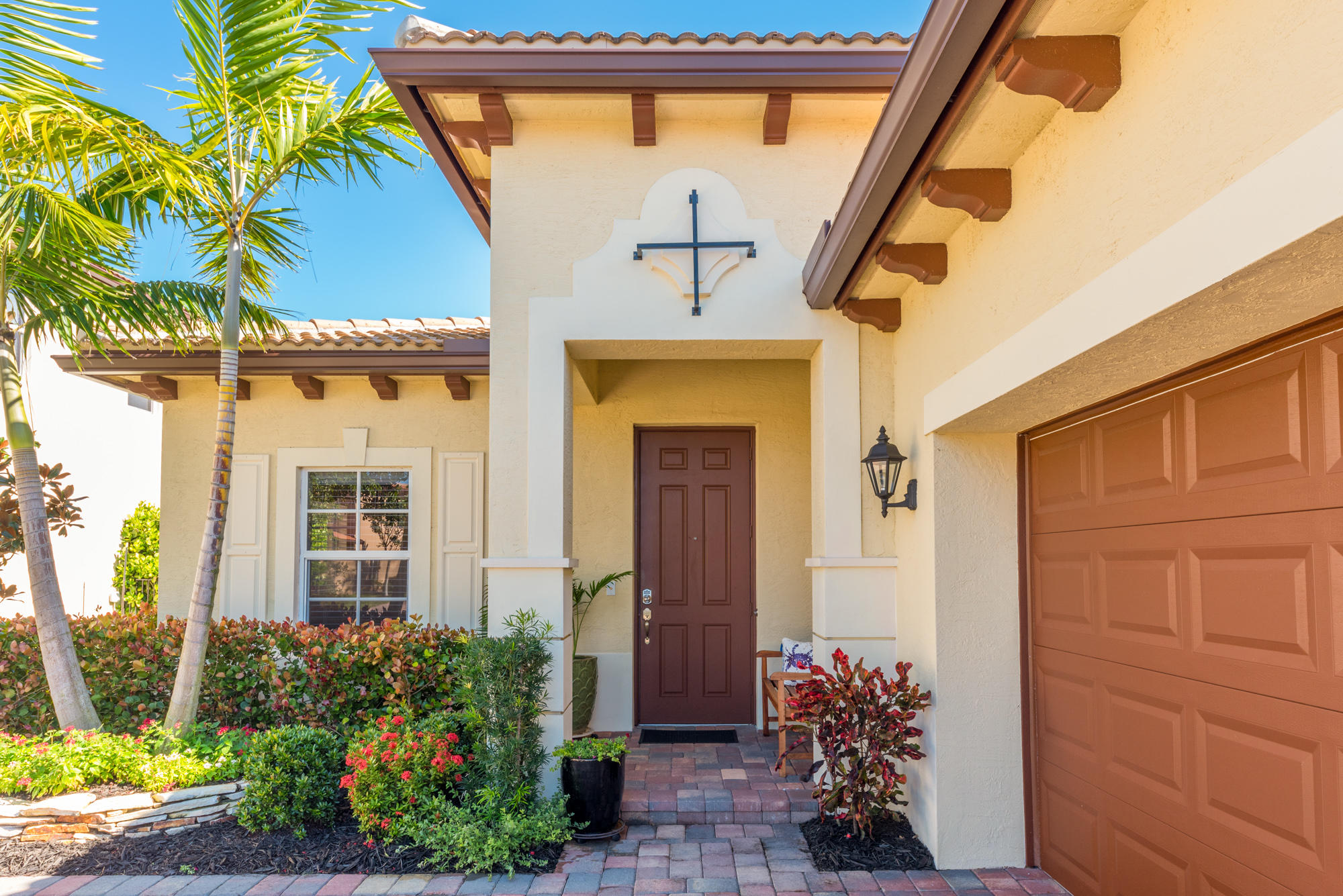 151 Rudder Cay Way Jupiter, FL 33458 - Photo 2 of 32 a front view of a house with a yard