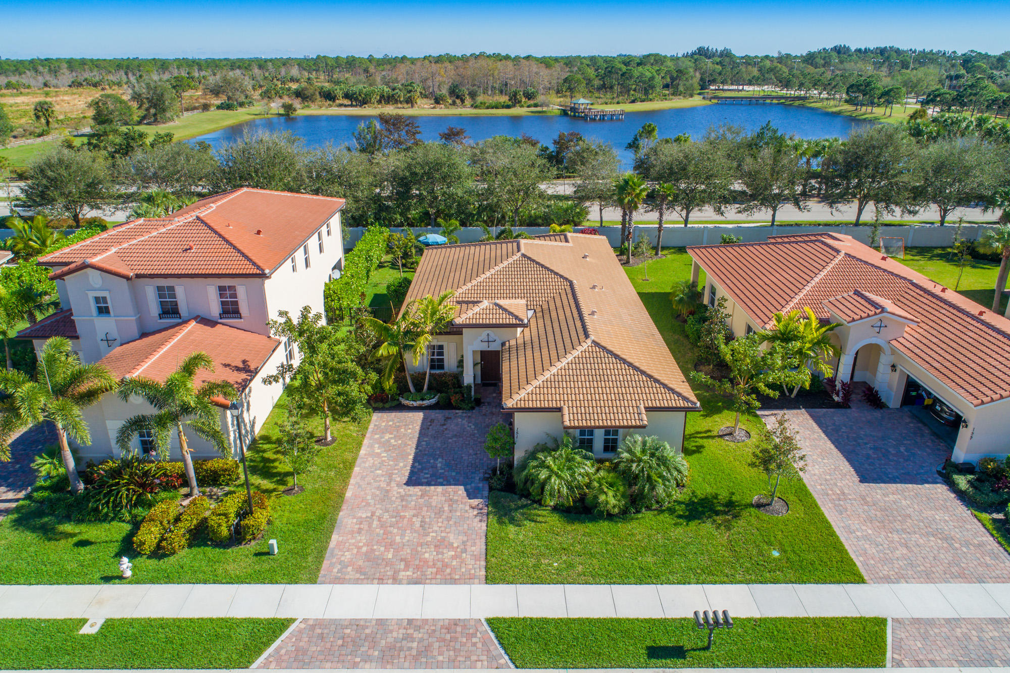 151 Rudder Cay Way Jupiter, FL 33458 - Photo 25 of 32 an aerial view of a house with garden space and ocean view
