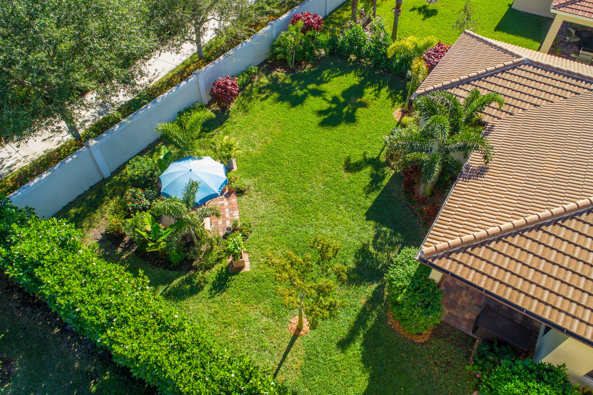 151 Rudder Cay Way Jupiter, FL 33458 - Photo 29 of 32 an aerial view of a house with a yard