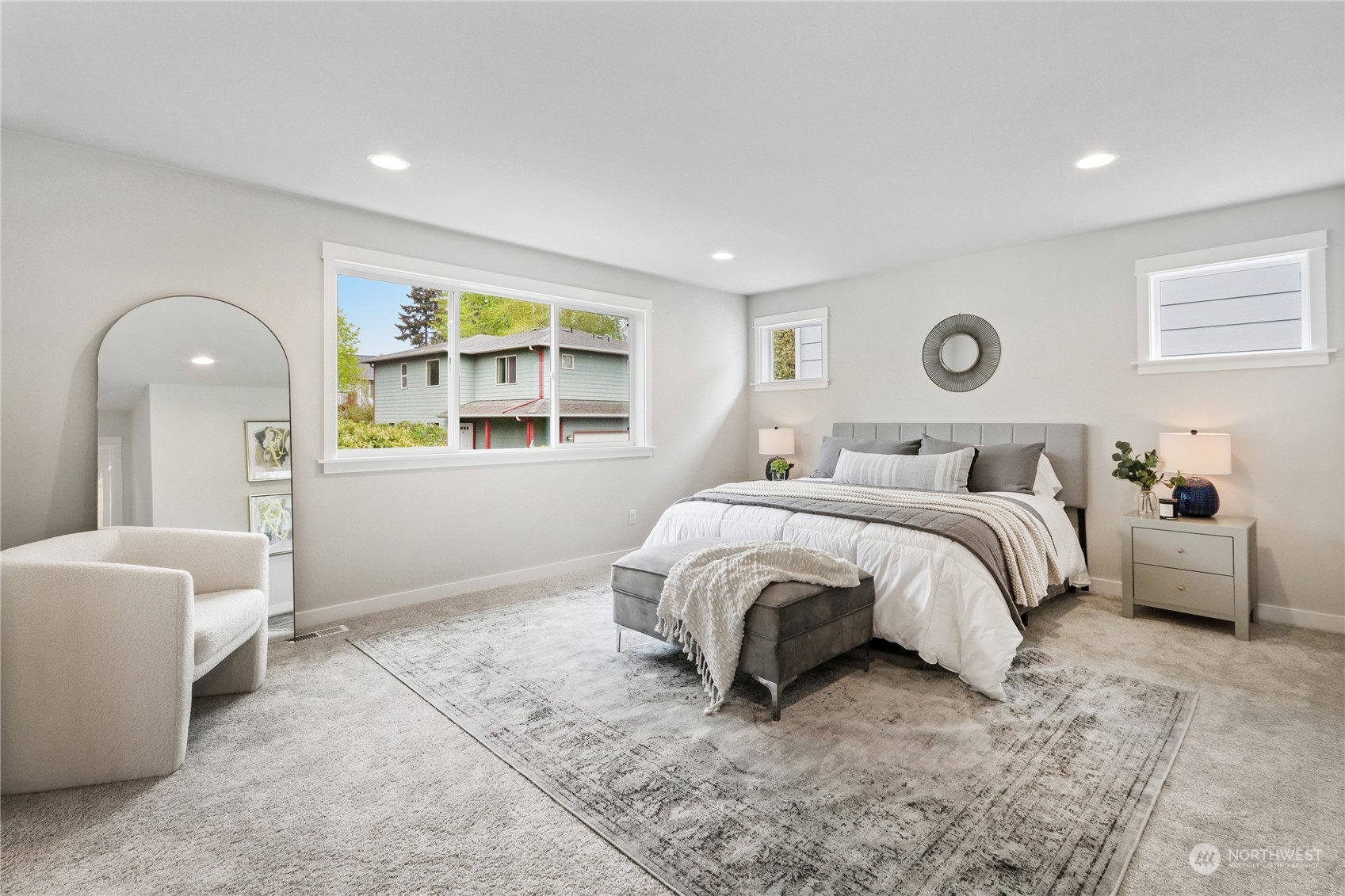 3915 211th Place Southeast Bothell, WA 98021 - Photo 17 of 24 a spacious bedroom with a bed and a window