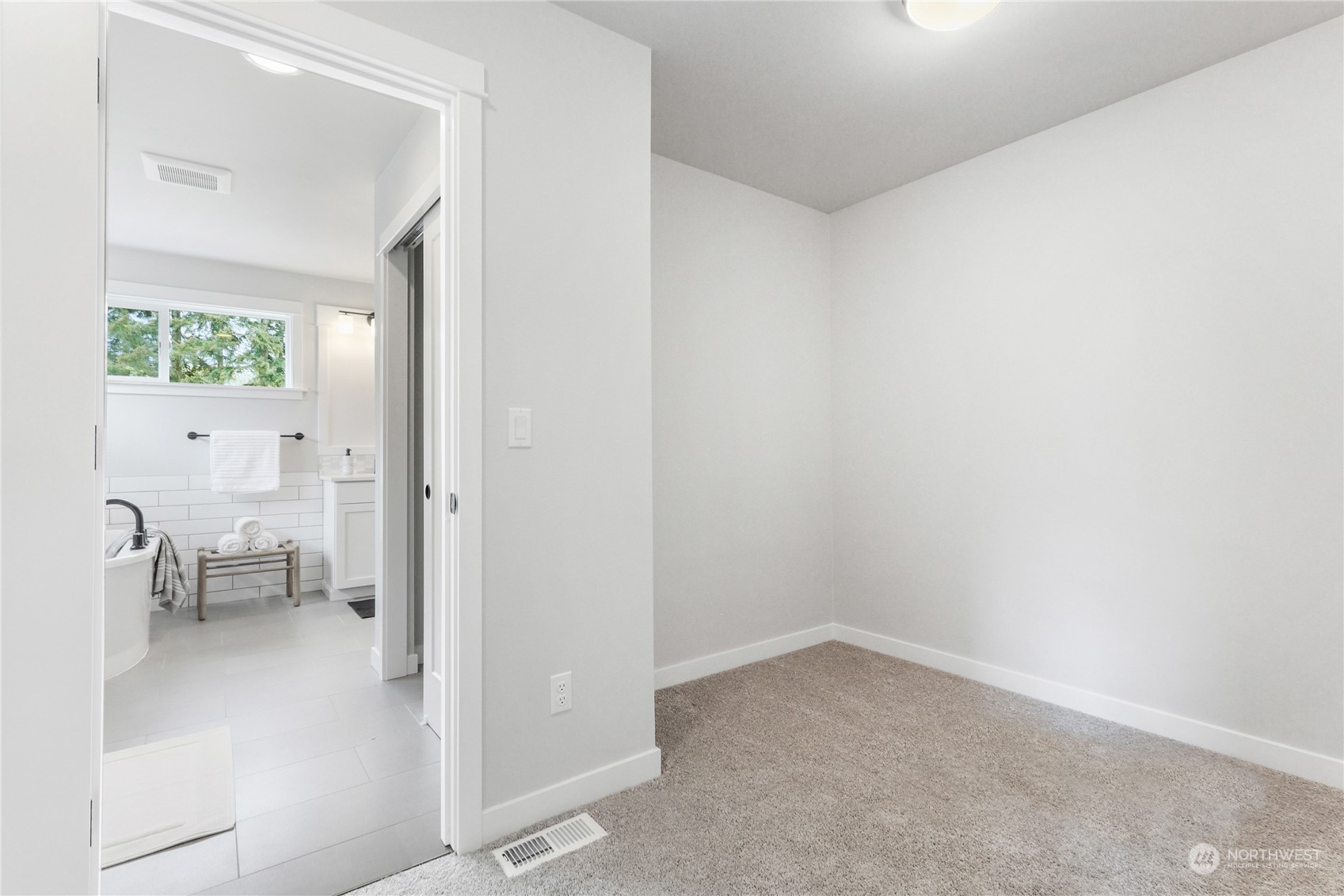 3915 211th Place Southeast Bothell, WA 98021 - Photo 21 of 24 a view of a room with wooden floor a bathroom