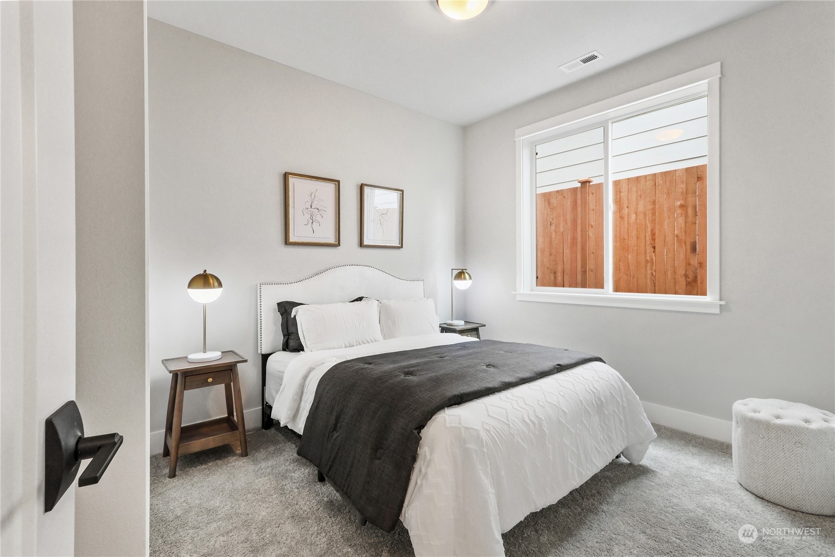 3915 211th Place Southeast Bothell, WA 98021 - Photo 22 of 24 a bedroom with a bed and a window