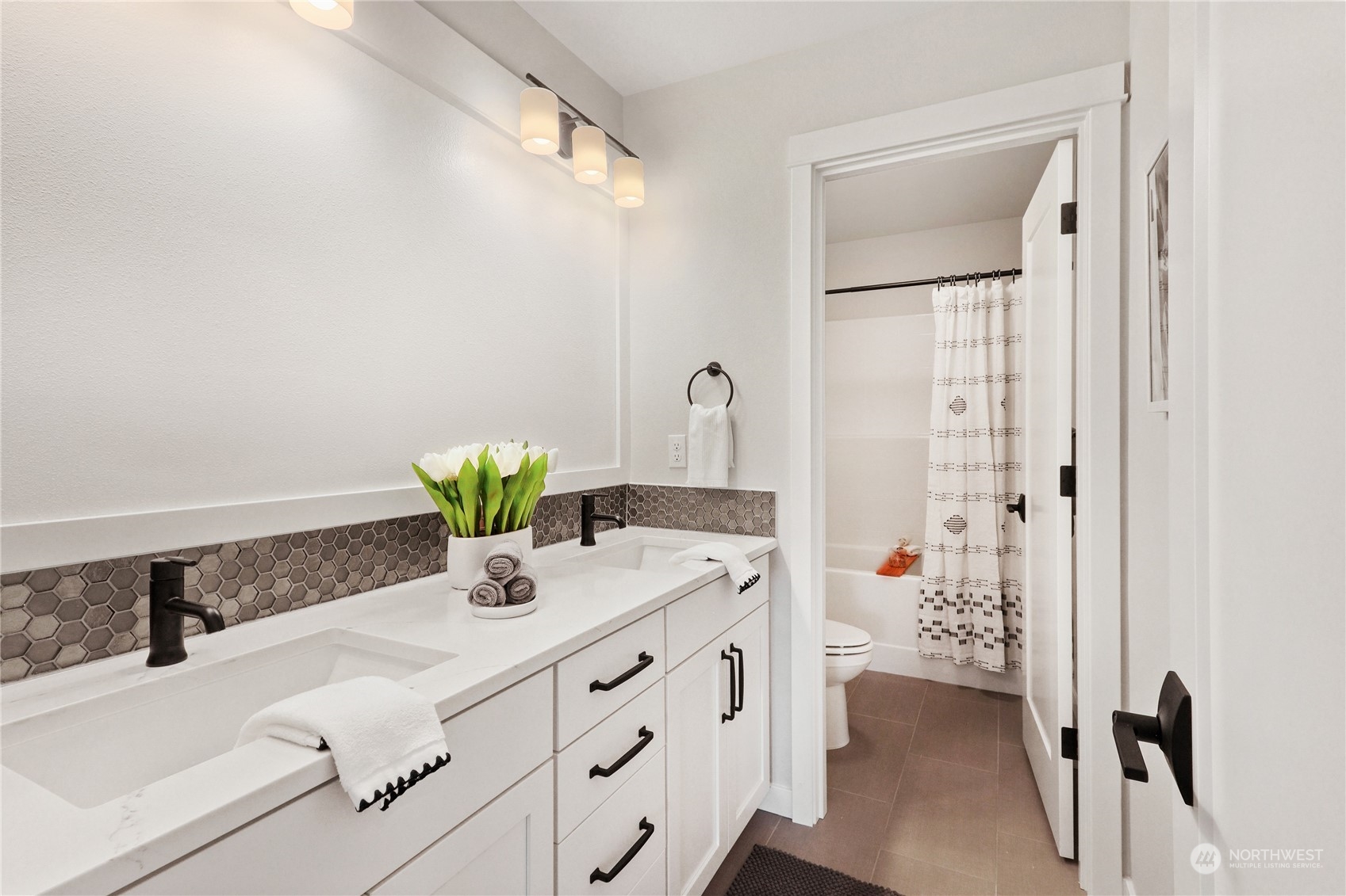 3915 211th Place Southeast Bothell, WA 98021 - Photo 23 of 24 a bathroom with a sink a vanity and a mirror