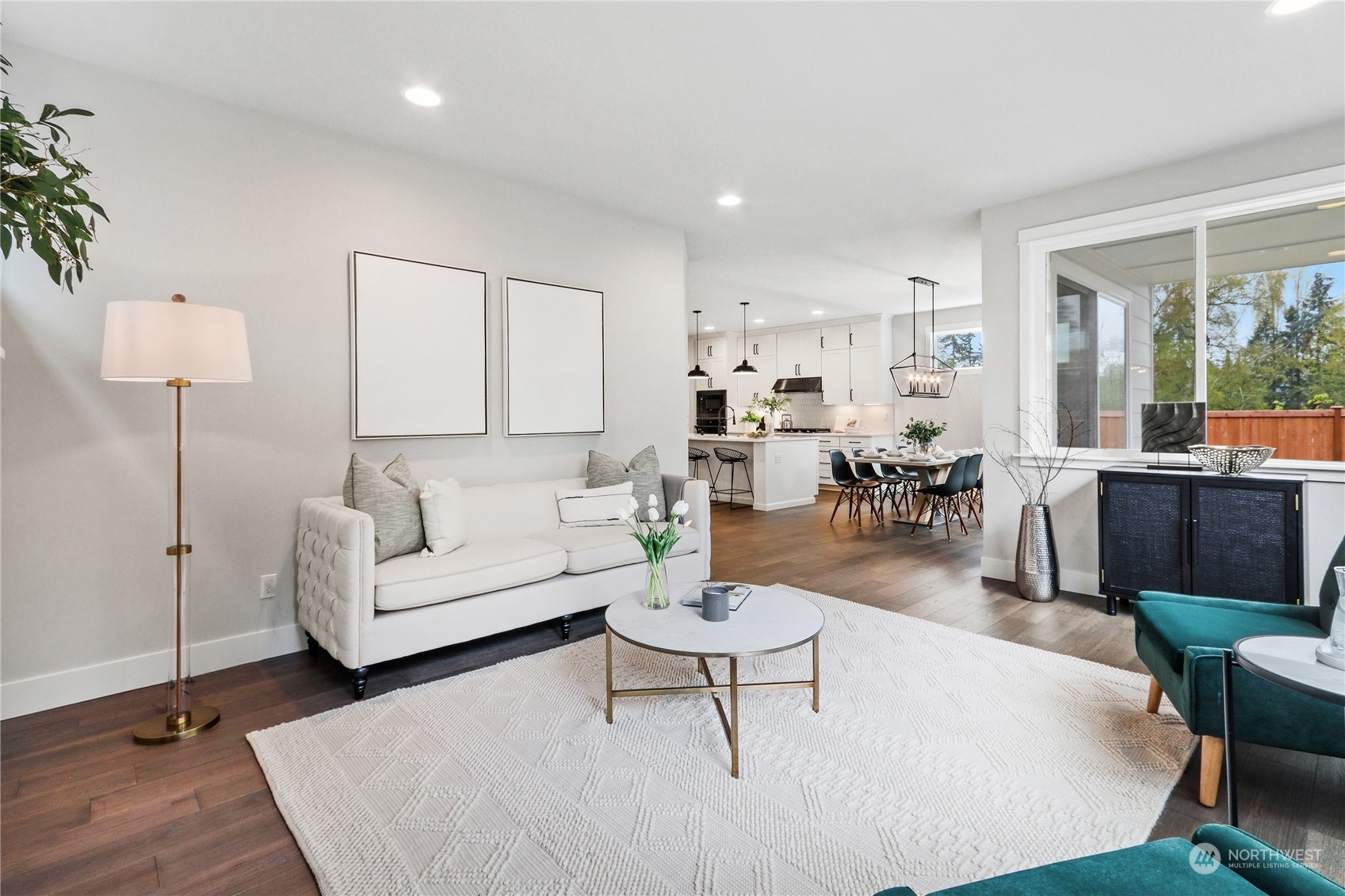 3915 211th Place Southeast Bothell, WA 98021 - Photo 5 of 24 a living room with furniture and a table