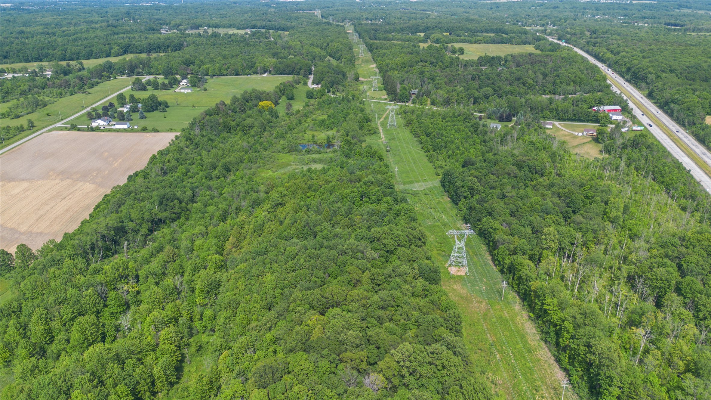 5460 Pinetree Road McKean, PA 16426 - Photo 15 of 18 a view of a lush green field