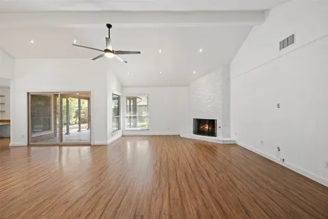 a view of kitchen and wooden floor