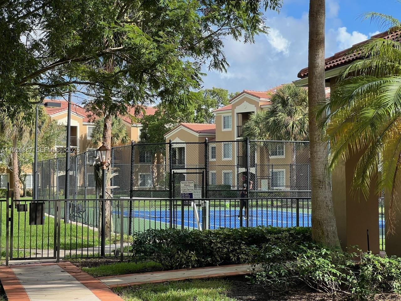 8000 North Nob Hill Road, Unit 204 Tamarac, FL 33321 - Photo 16 of 27 front view of a house