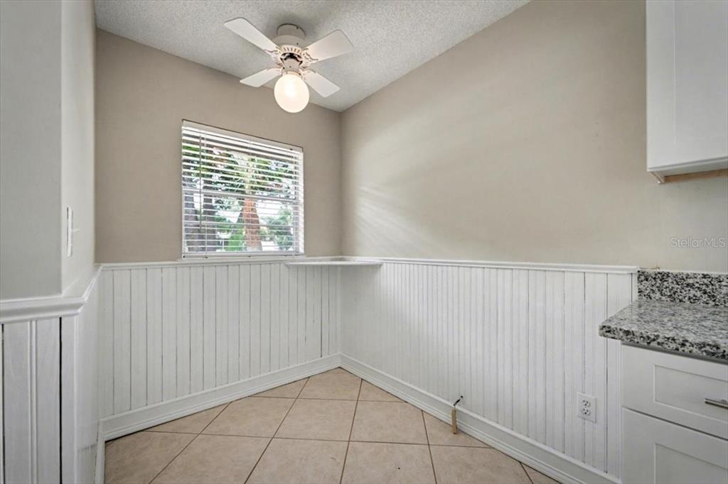 173 North Ridgewood Avenue Ormond Beach, FL 32174 - Photo 17 of 33 a view of an empty room with a window