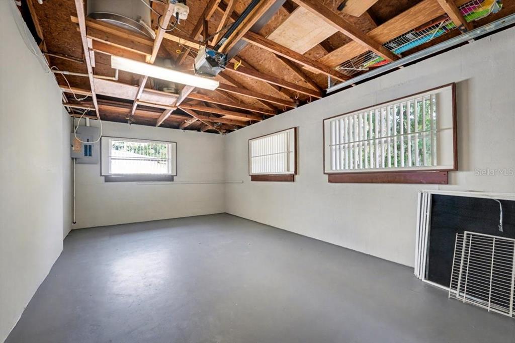 173 North Ridgewood Avenue Ormond Beach, FL 32174 - Photo 24 of 33 a view of an empty room with a window