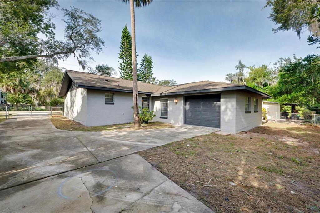 173 North Ridgewood Avenue Ormond Beach, FL 32174 - Photo 32 of 33 a view of a house with a outdoor space
