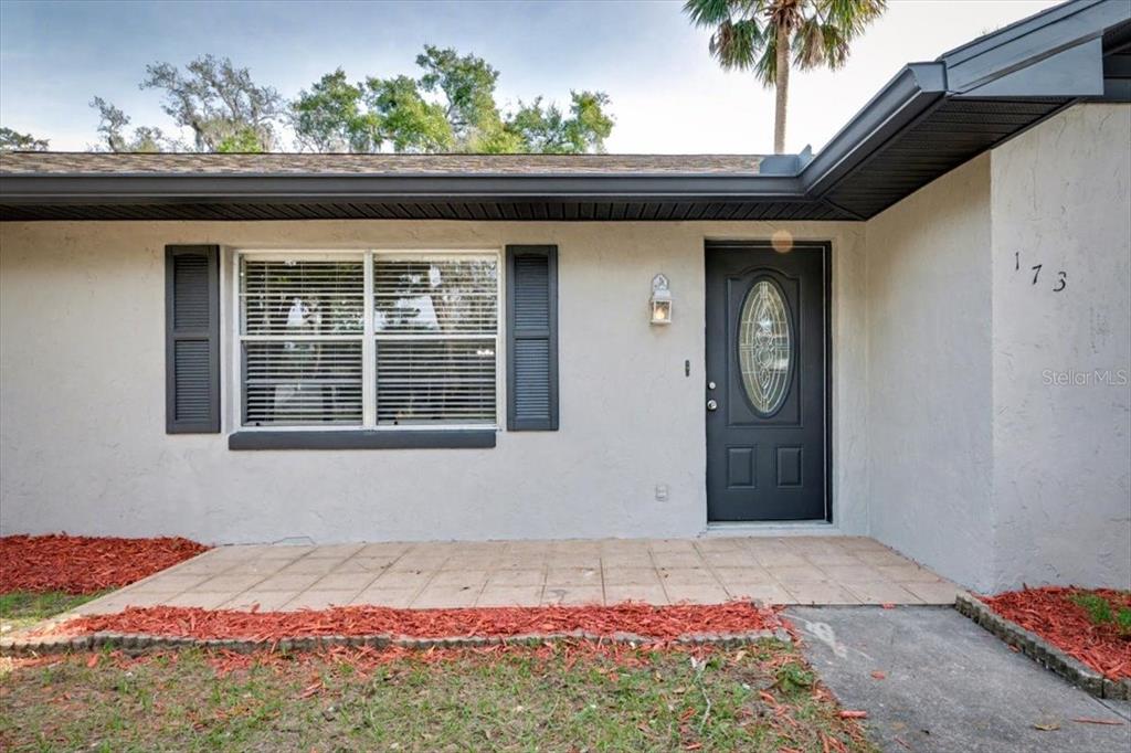 173 North Ridgewood Avenue Ormond Beach, FL 32174 - Photo 5 of 33 a front view of a house