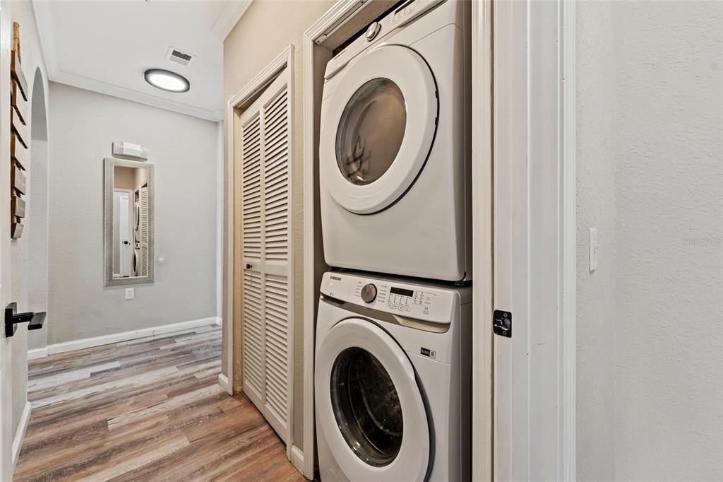 14200 Avalon Road, Unit 409 Winter Garden, FL 34787 - Photo 21 of 33 a utility room with dryer and washer