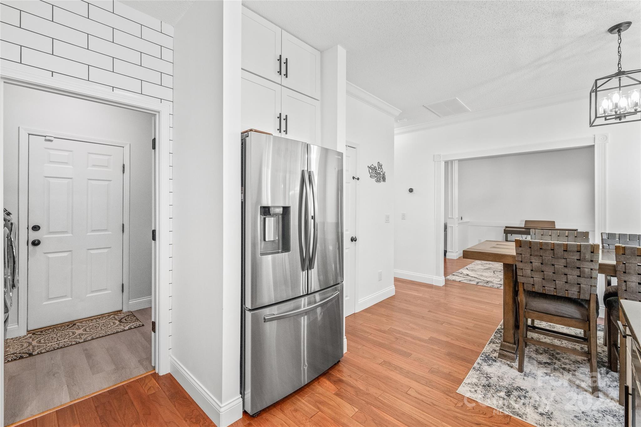 3008 Viola Lane Monroe, NC 28110 - Photo 20 of 36 a view of kitchen with furniture and refrigerator