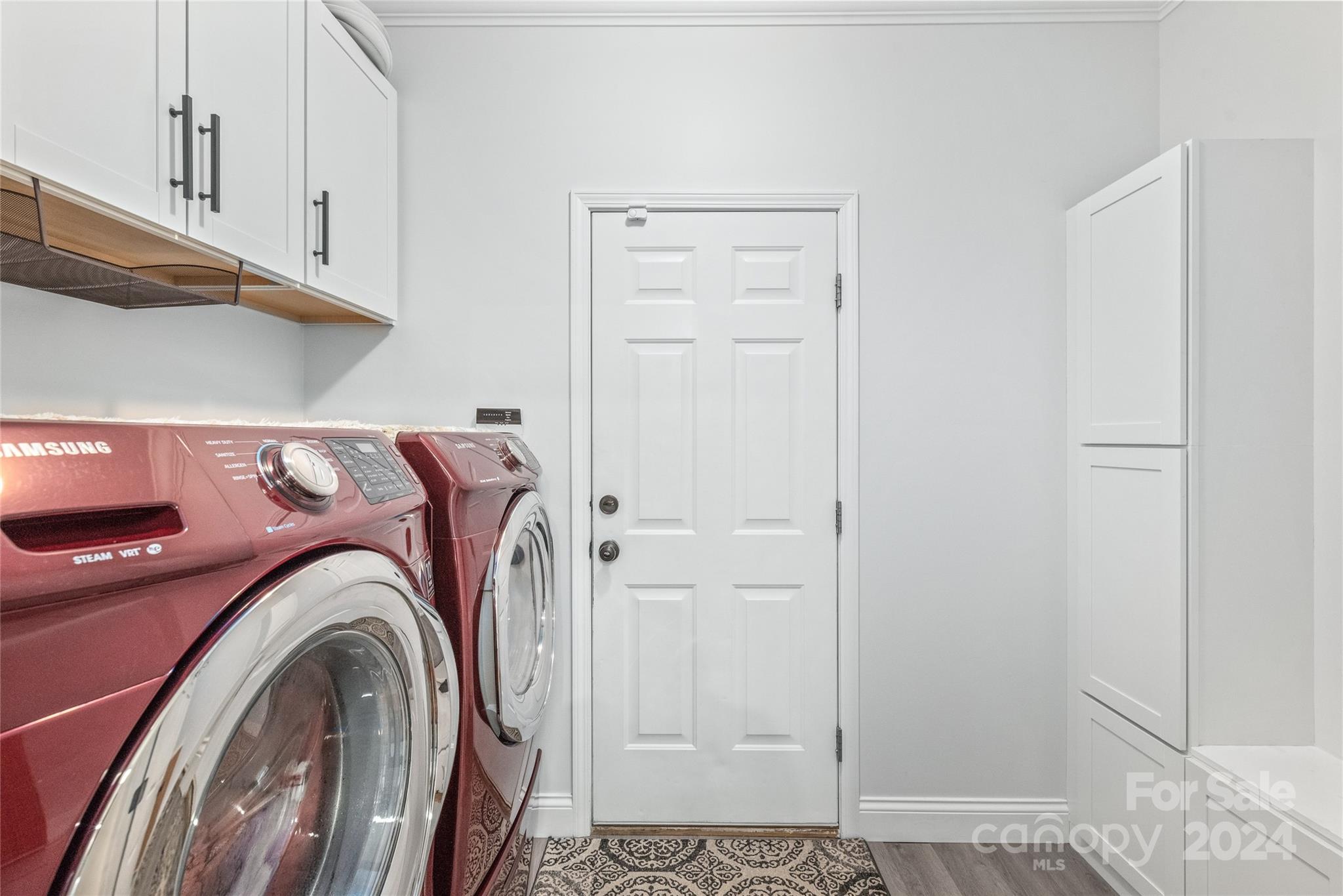 3008 Viola Lane Monroe, NC 28110 - Photo 21 of 36 a view of storage and utility room with washer and dryer