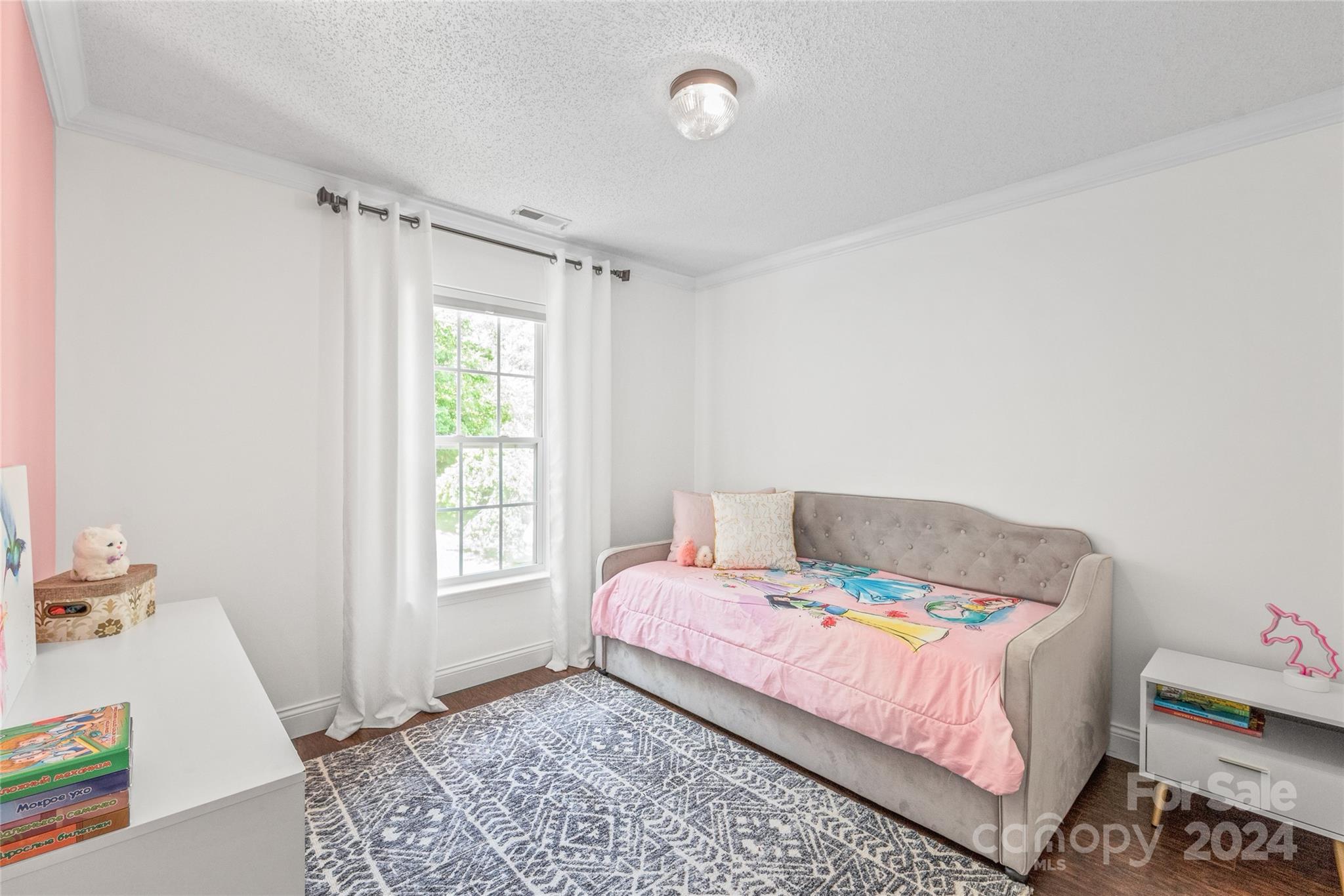 3008 Viola Lane Monroe, NC 28110 - Photo 27 of 36 a bedroom with a bed and window