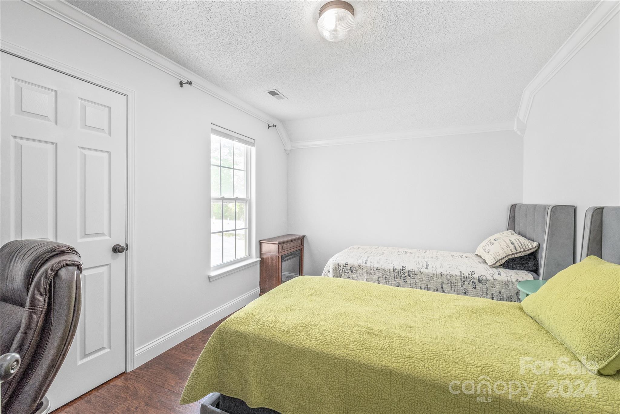 3008 Viola Lane Monroe, NC 28110 - Photo 29 of 36 a bedroom with a bed and window
