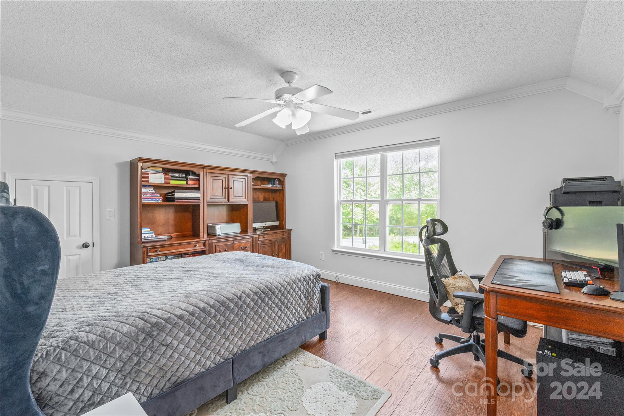 3008 Viola Lane Monroe, NC 28110 - Photo 30 of 36 a bedroom with a large bed and a window