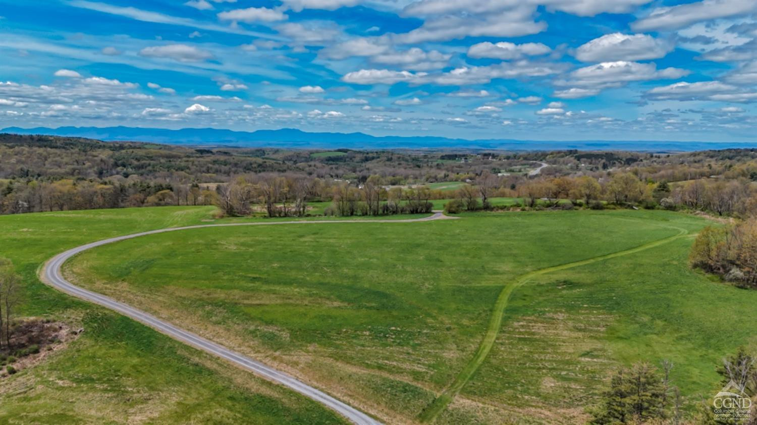 a view of a golf course with a yard