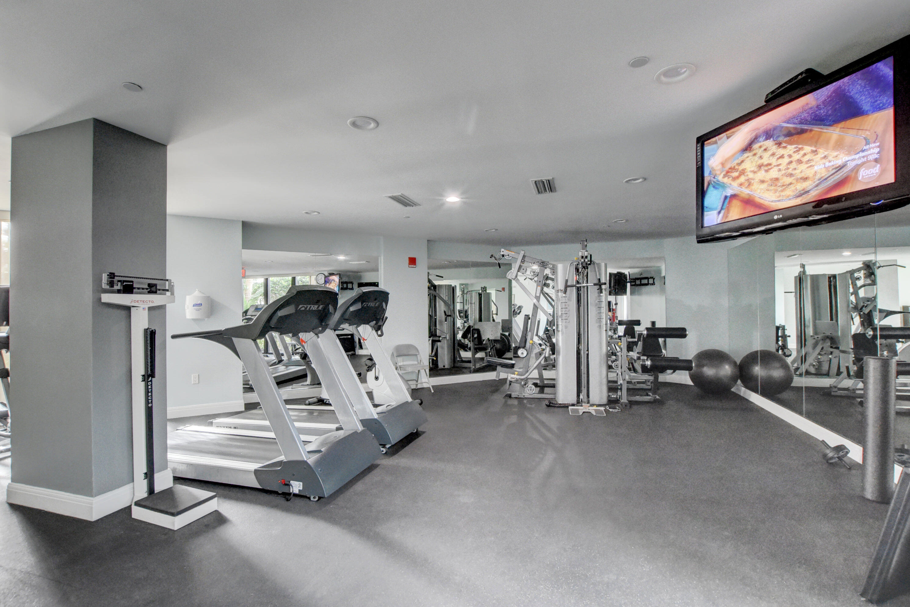 3000 North Ocean Drive, Unit 4F Riviera Beach, FL 33404 - Photo 28 of 56 a view of a room with gym equipment