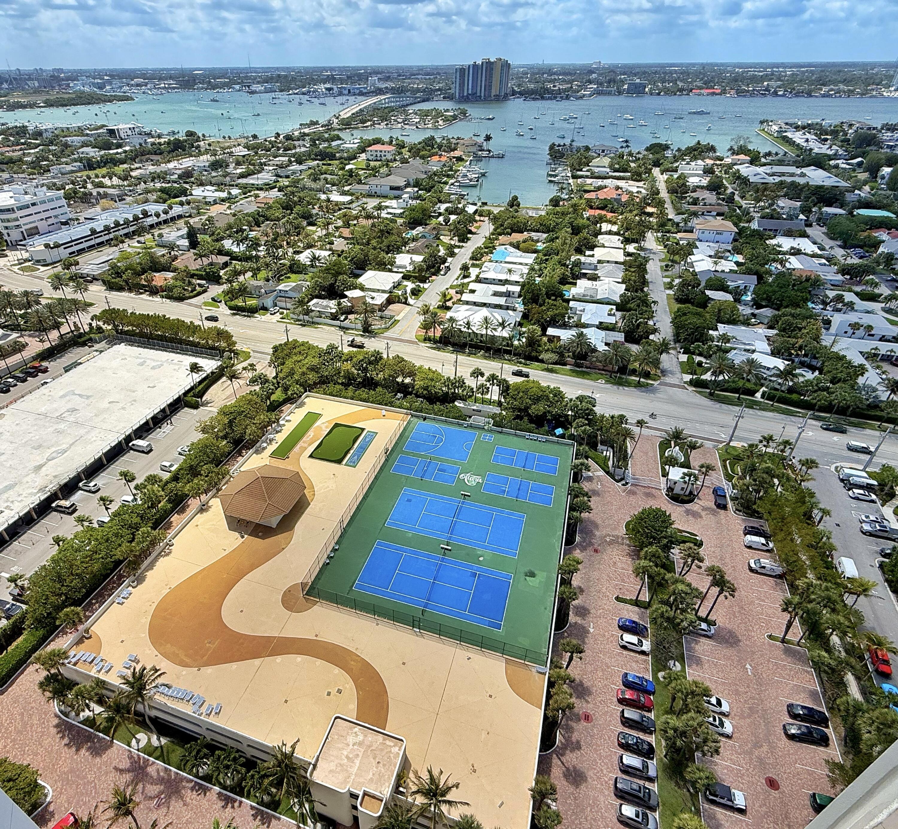 3000 North Ocean Drive, Unit 4F Riviera Beach, FL 33404 - Photo 53 of 56 an aerial view of residential houses with outdoor space