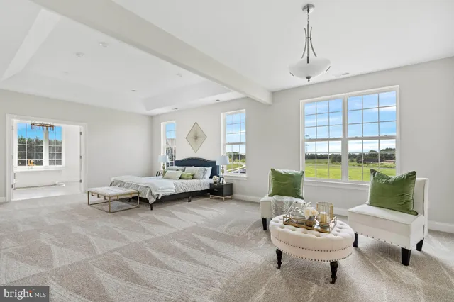 a bedroom with a bed and a night stand