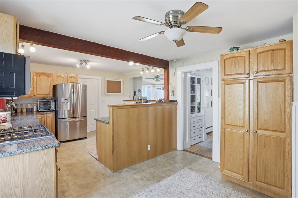 8 Perham Street Chelmsford, MA 01824 - Photo 13 of 28 a view of kitchen with refrigerator cabinets and stainless steel appliances