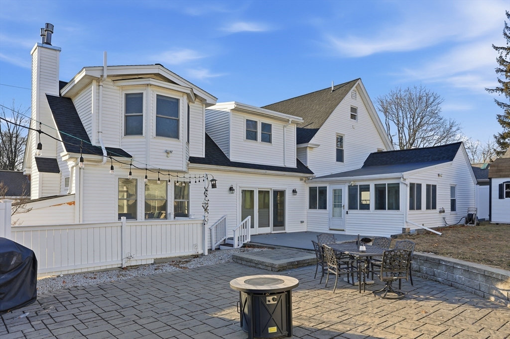 8 Perham Street Chelmsford, MA 01824 - Photo 28 of 28 a front view of a house with a yard
