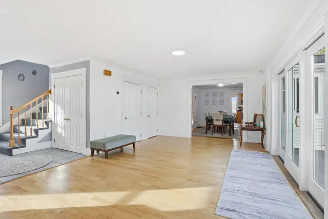 a view of a living room and dining room