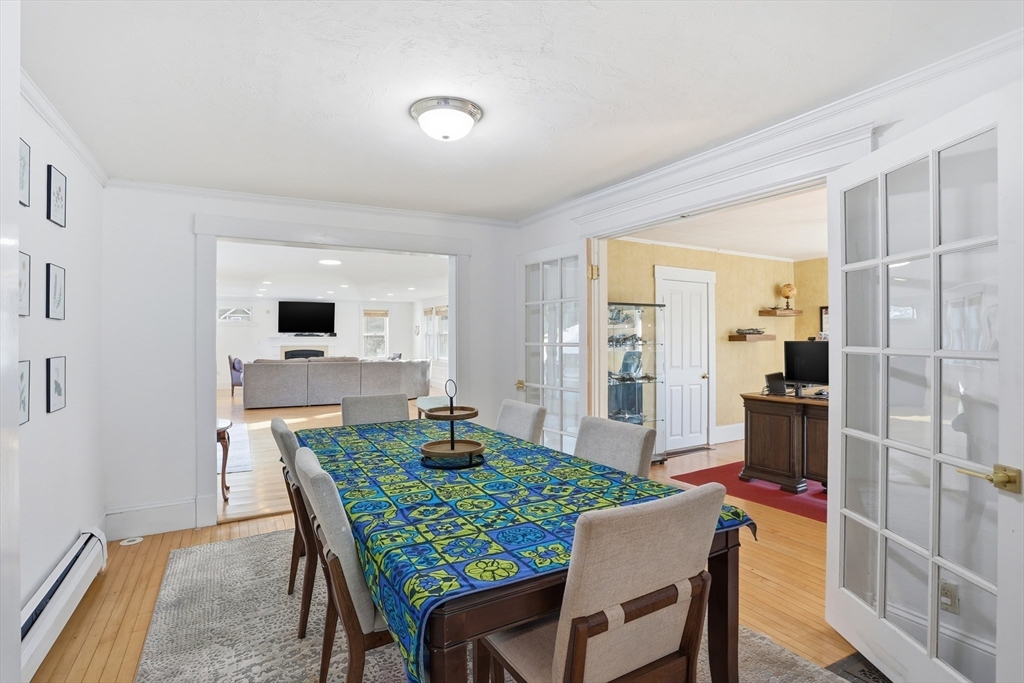 8 Perham Street Chelmsford, MA 01824 - Photo 9 of 28 a view of a dining room with furniture and wooden floor