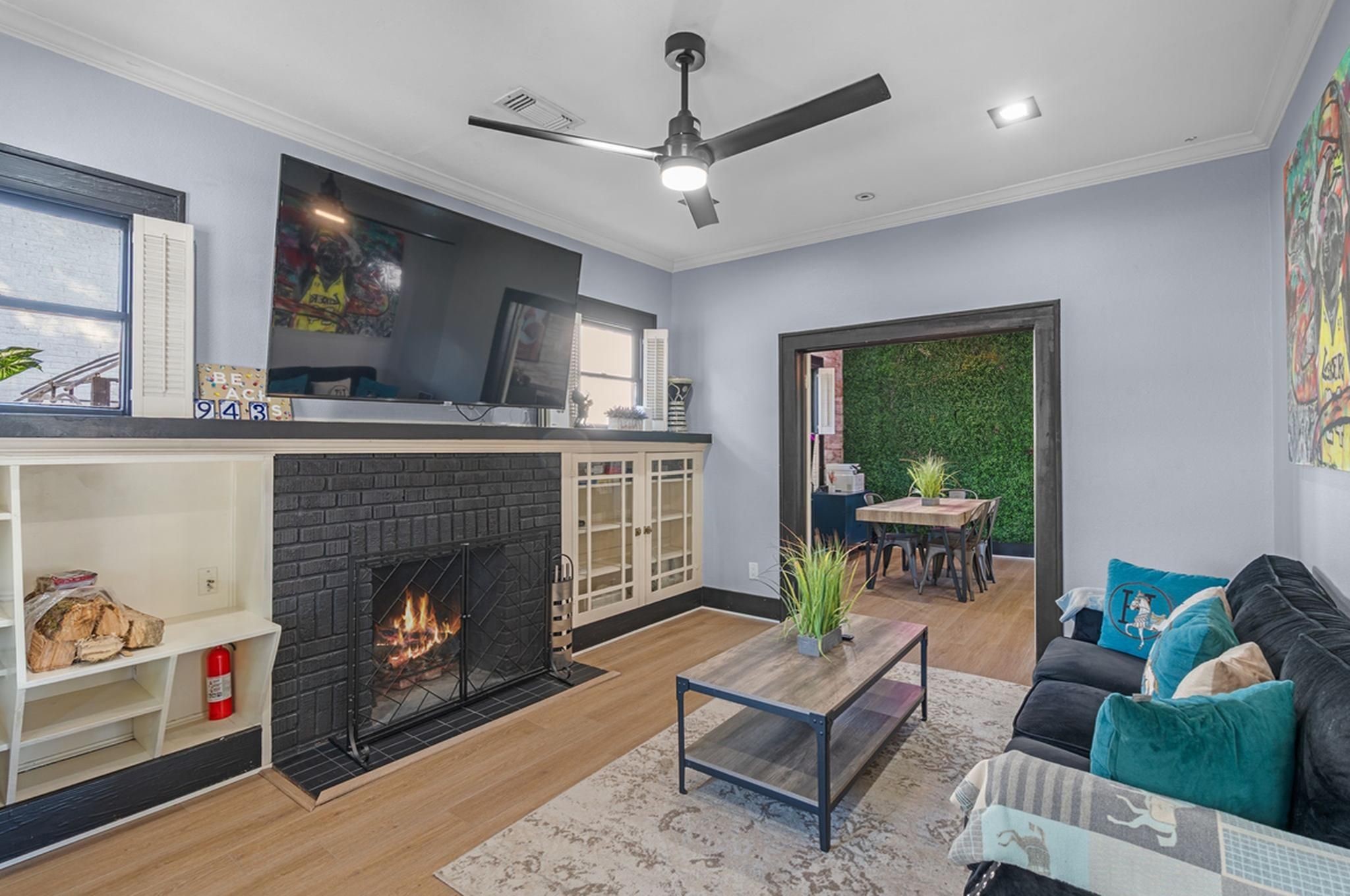 943 Pecore Street Houston, TX 77009 - Photo 2 of 19 This home features luxury vinyl flooring, crown Molding, and premium trims/baseboards throughout the entire home.
