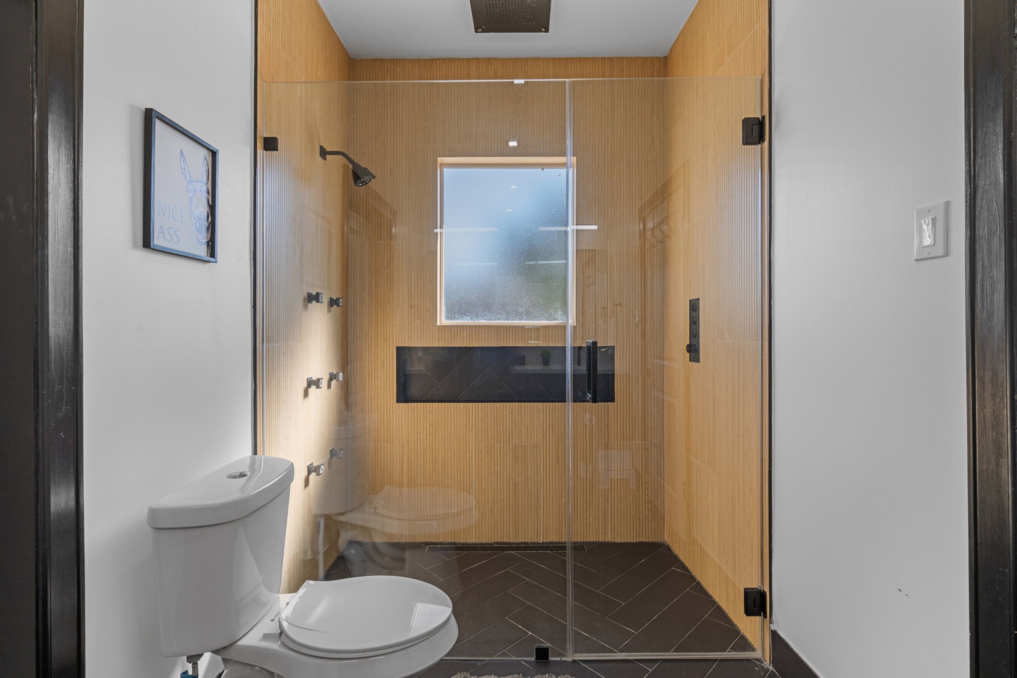 943 Pecore Street Houston, TX 77009 - Photo 3 of 19 Fully remodeled bathroom with a walk-in shower!