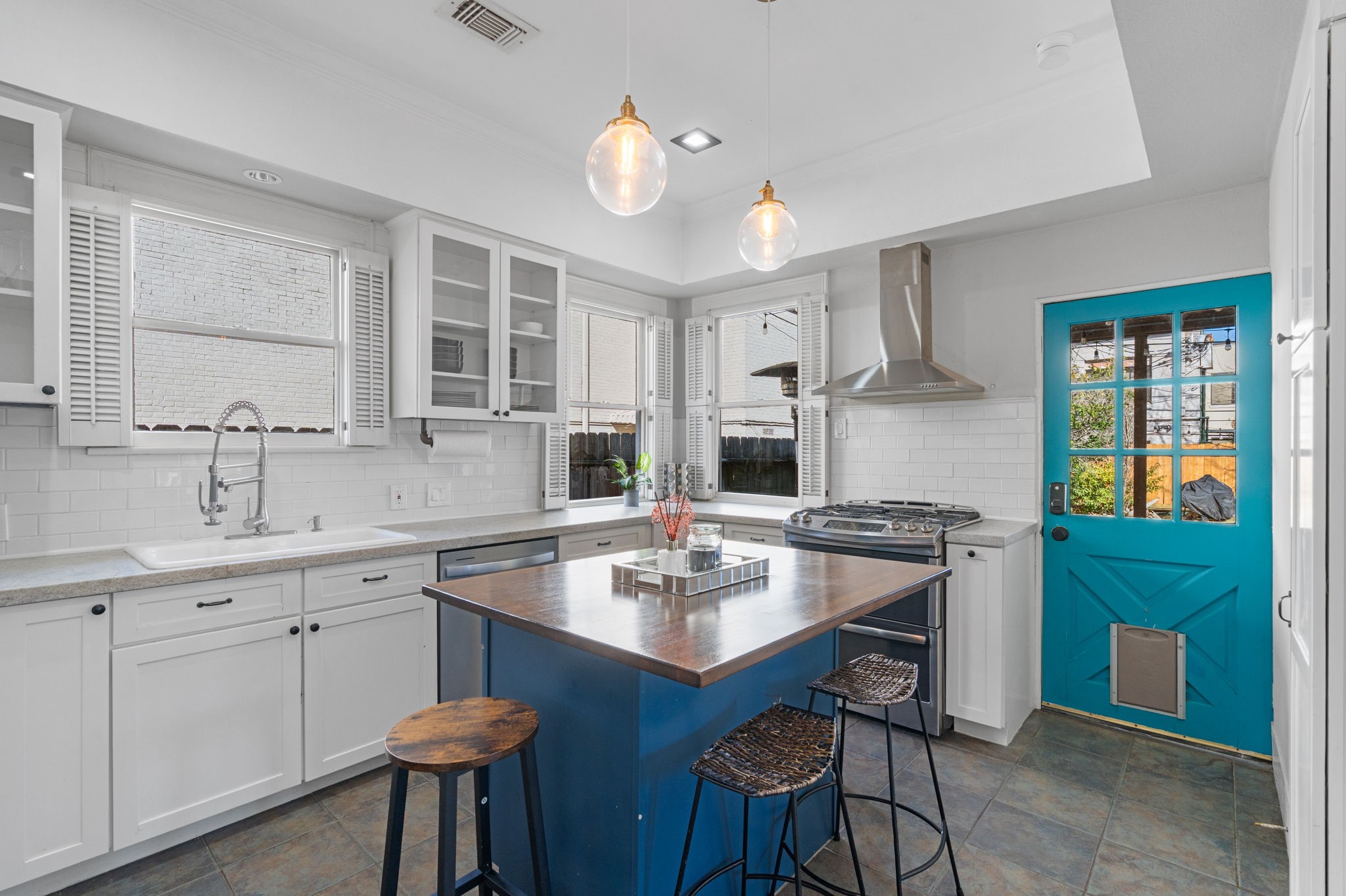 943 Pecore Street Houston, TX 77009 - Photo 6 of 19 Fully remodeled kitchen with a ton of cabinet space and windows for natural light!