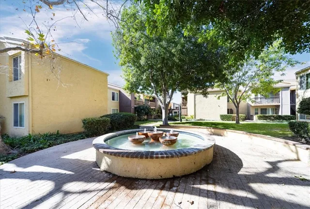 a view of a building and a garden