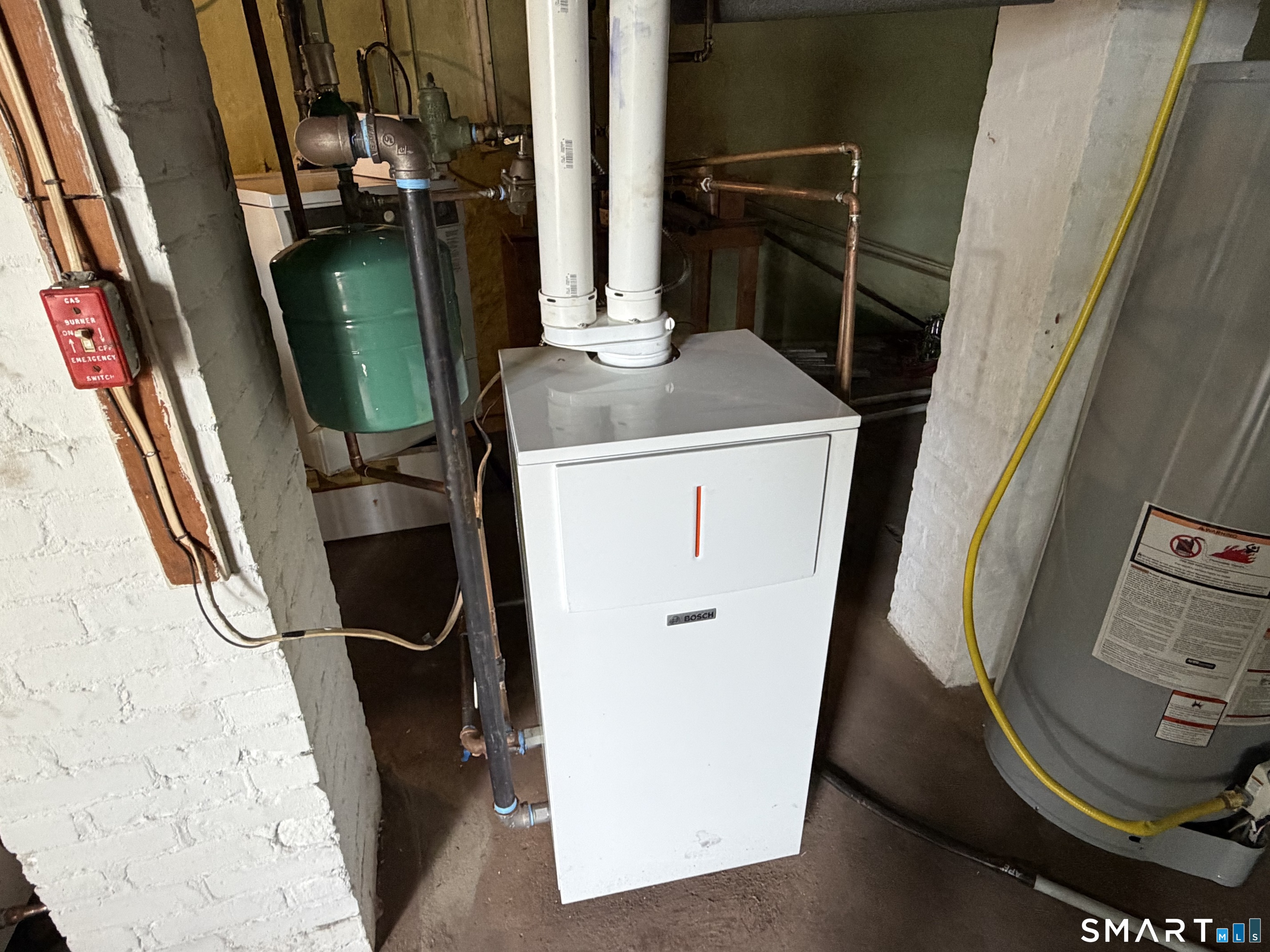 67 Pine Street Meriden, CT 06451 - Photo 26 of 34 a utility room with wooden floor washer and dryer