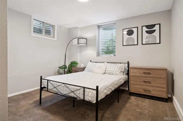 a bedroom with a bed and a shower