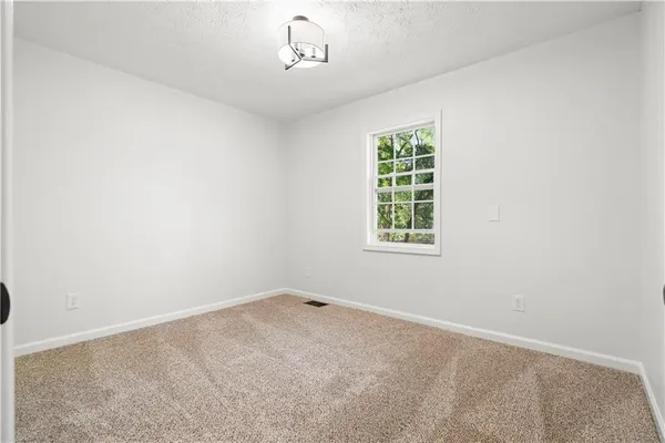 $279,900 | 8363 Norris Lake Road, Snellville, GA 30039