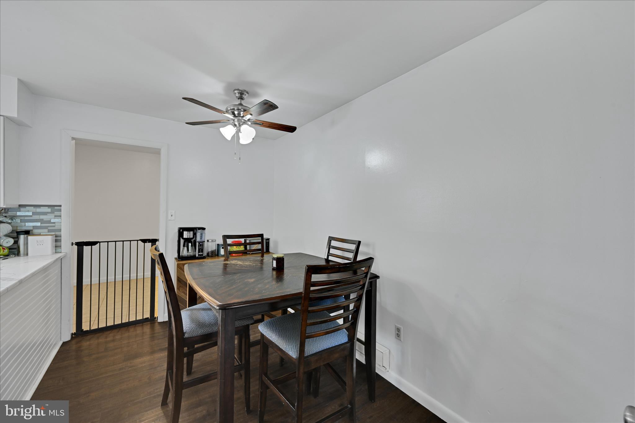 1053 Williamsburg Road Lancaster, PA 17603 - Photo 13 of 33 a view of a dining room with furniture and a chandelier fan