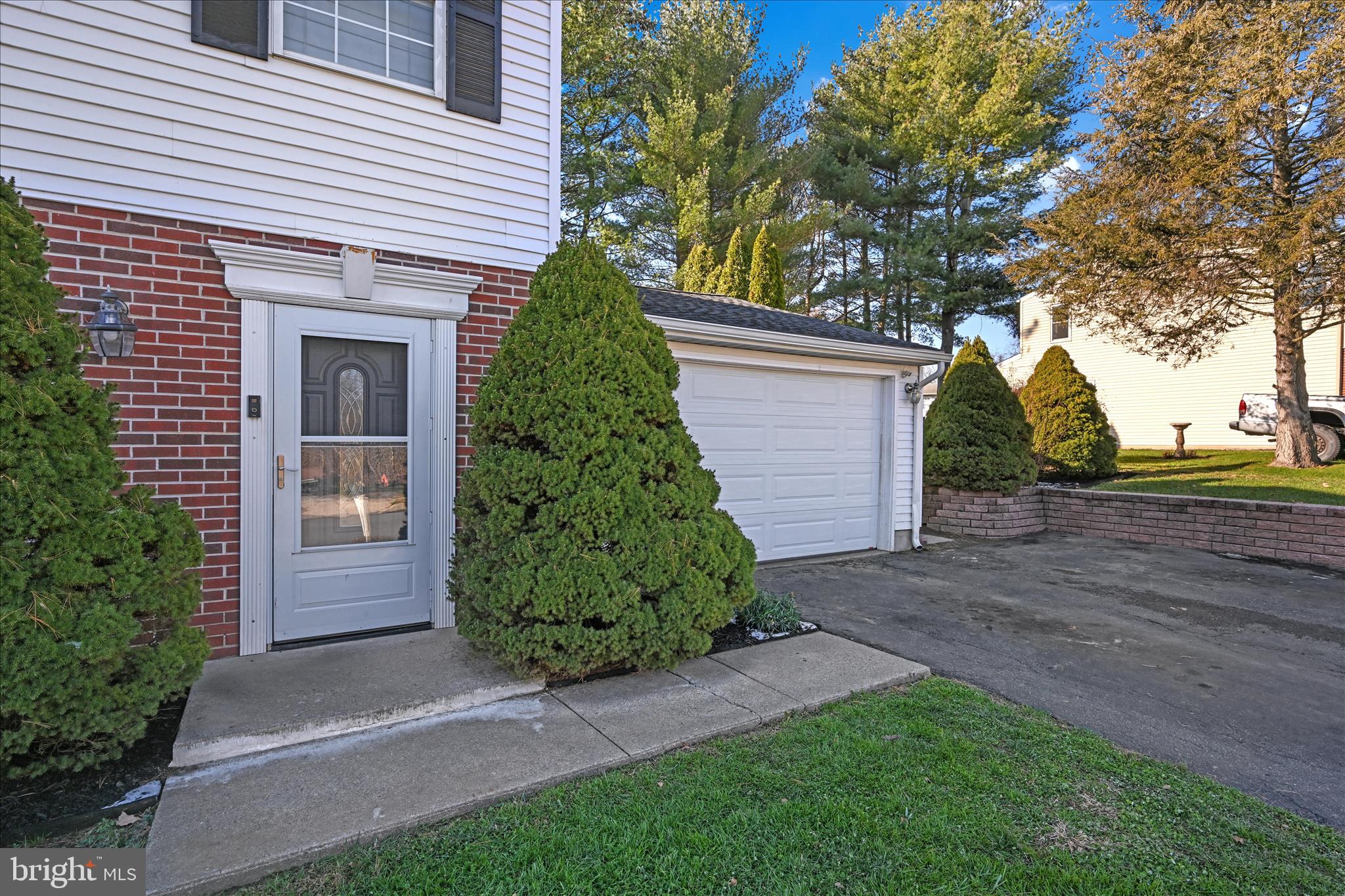 1053 Williamsburg Road Lancaster, PA 17603 - Photo 8 of 33 a front view of a house with a yard and garage