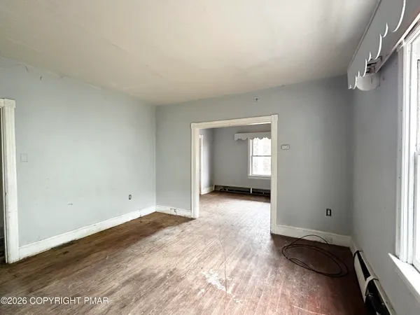 a kitchen with stainless steel appliances a stove a sink and a refrigerator