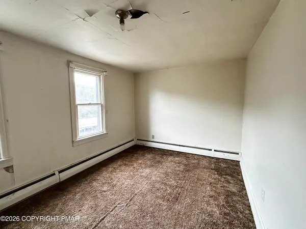 an empty room with closet