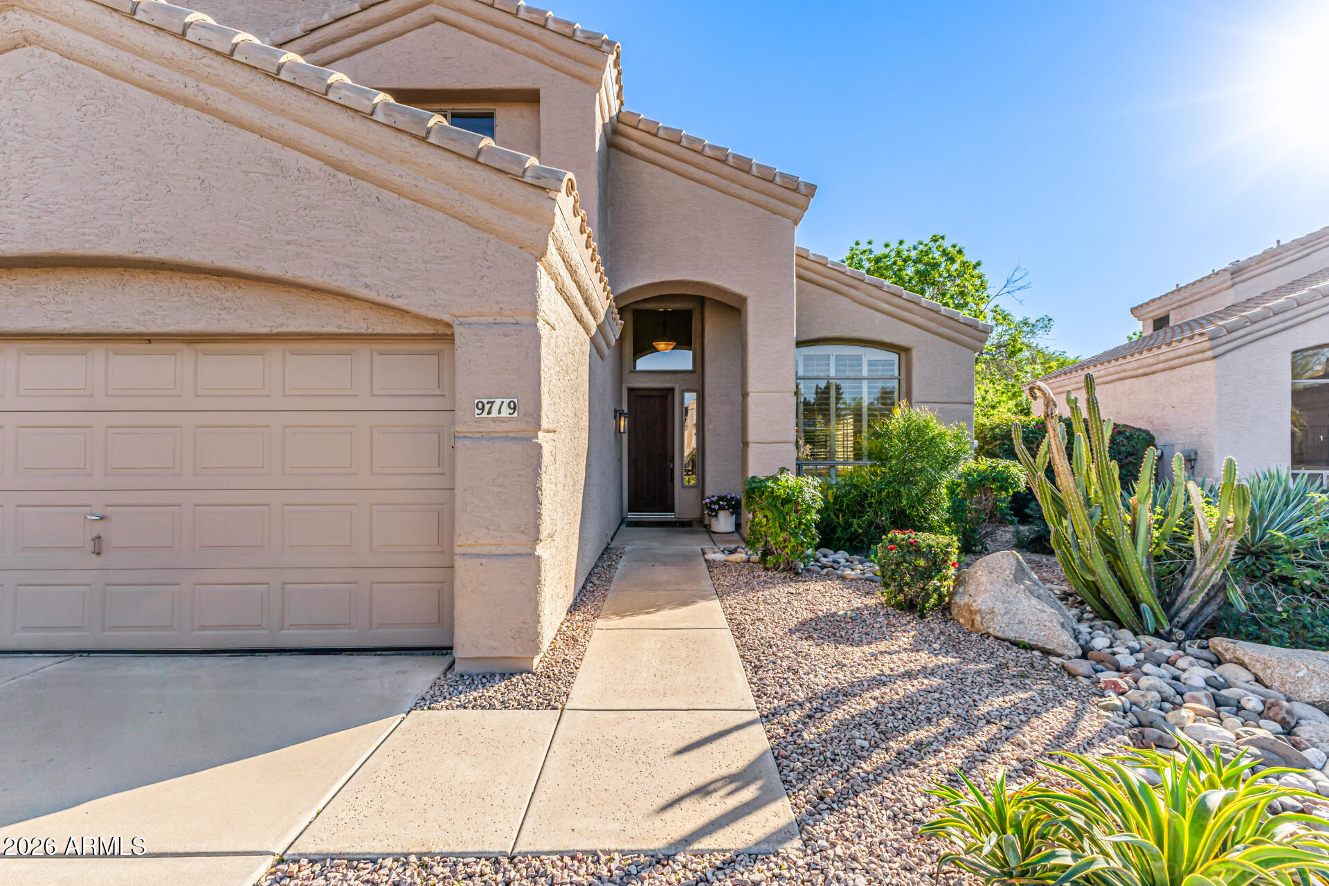 9719 East Pine Valley Road Scottsdale, AZ 85260 - Photo 2 of 62 a view of a back yard of the house