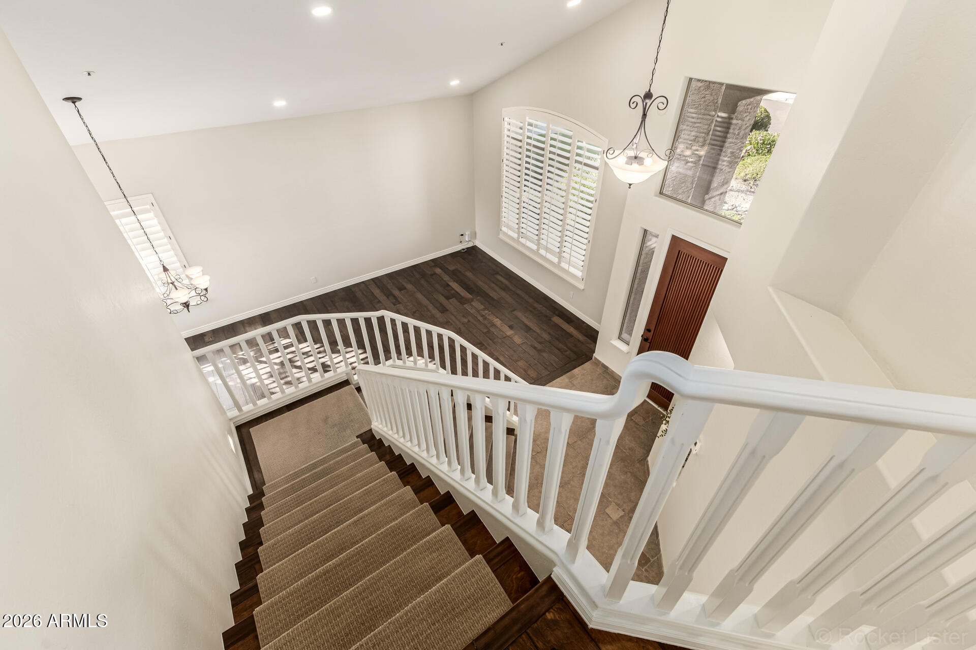 9719 East Pine Valley Road Scottsdale, AZ 85260 - Photo 27 of 62 a view of an entryway with wooden floor